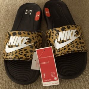 Brand new Womens Nike slides - size 7
